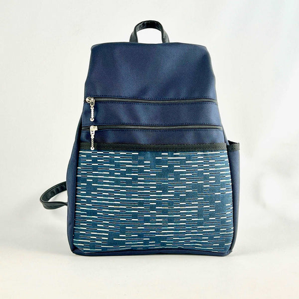 B968-NV Medium Side Entry Backpack in Navy Nylon with Fabric Accent Pocket